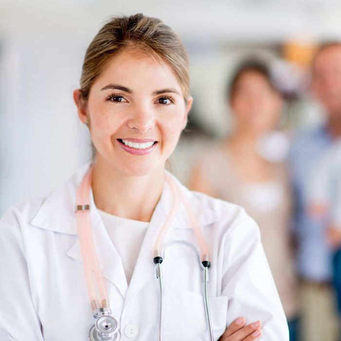 smiling doctor with stethoscope